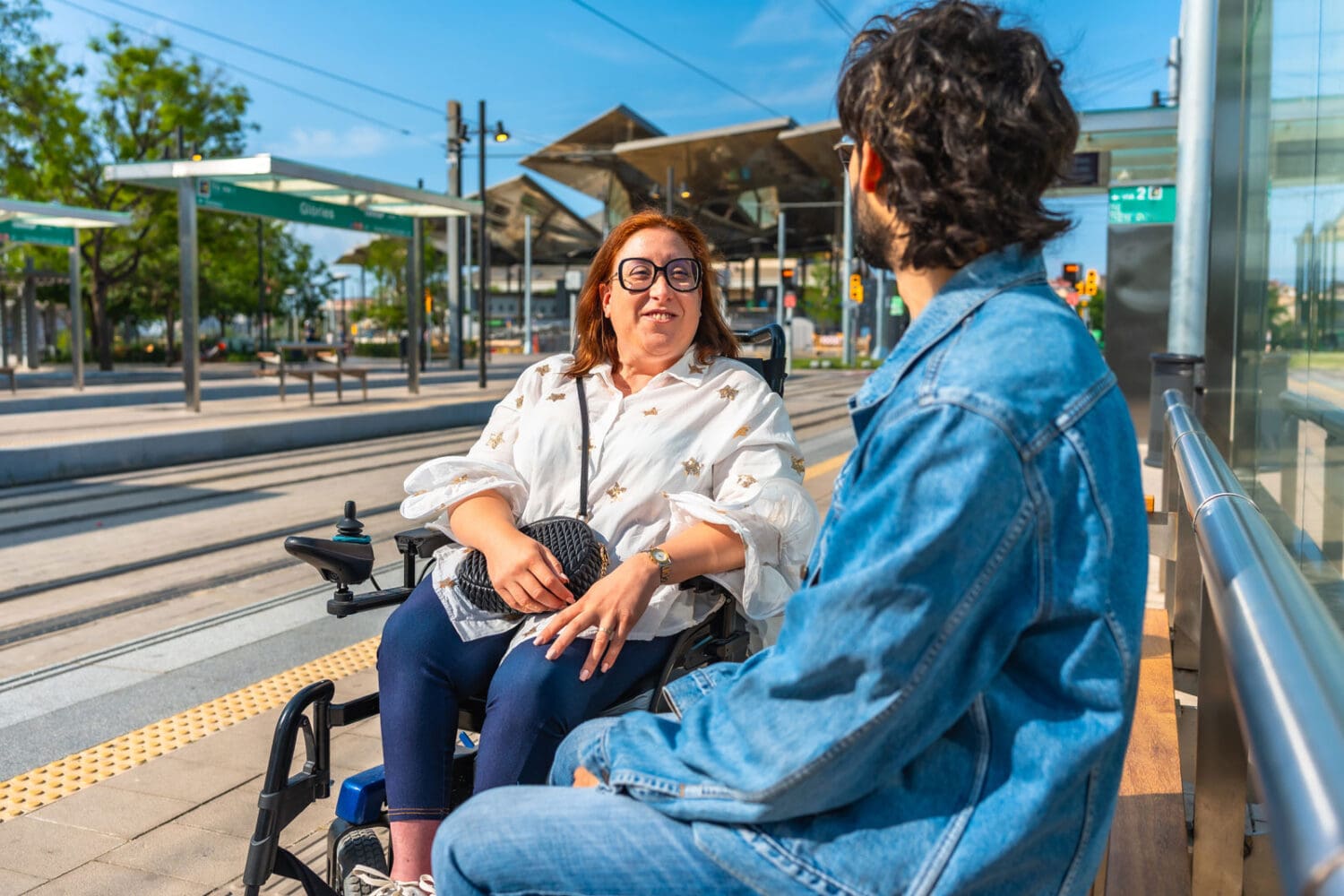 Two people waiting for the lightrail