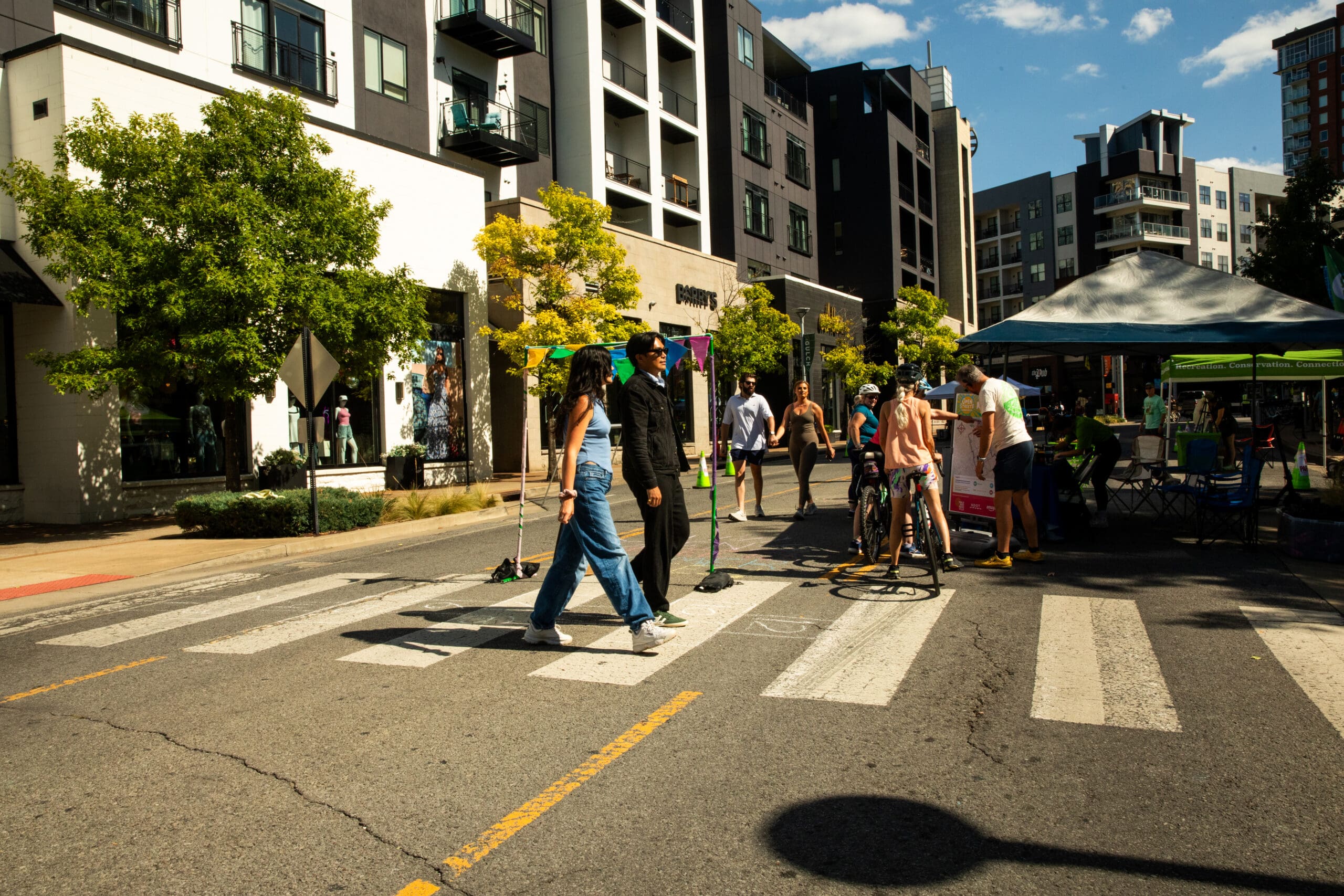 pedestrians cross a street in nashville