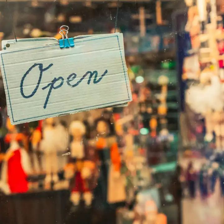 open sign in a storefront window