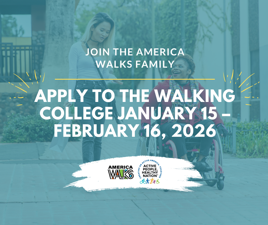 two people walk, one in a wheelchair