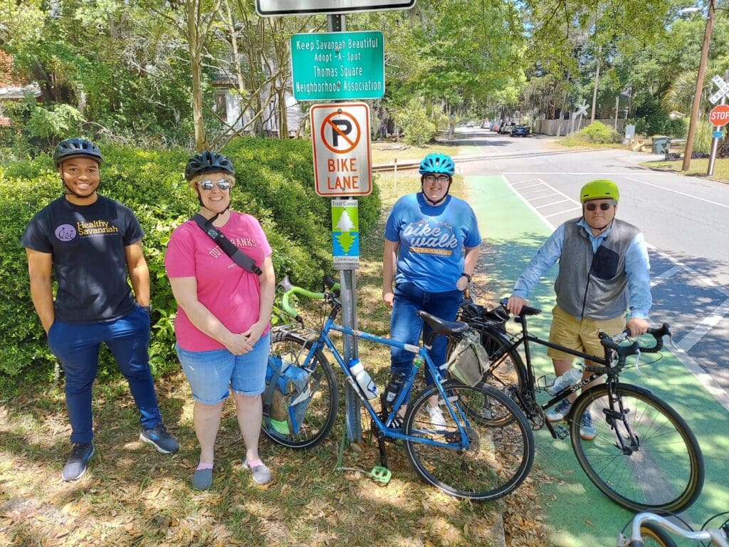 people biking on the tide to town trail