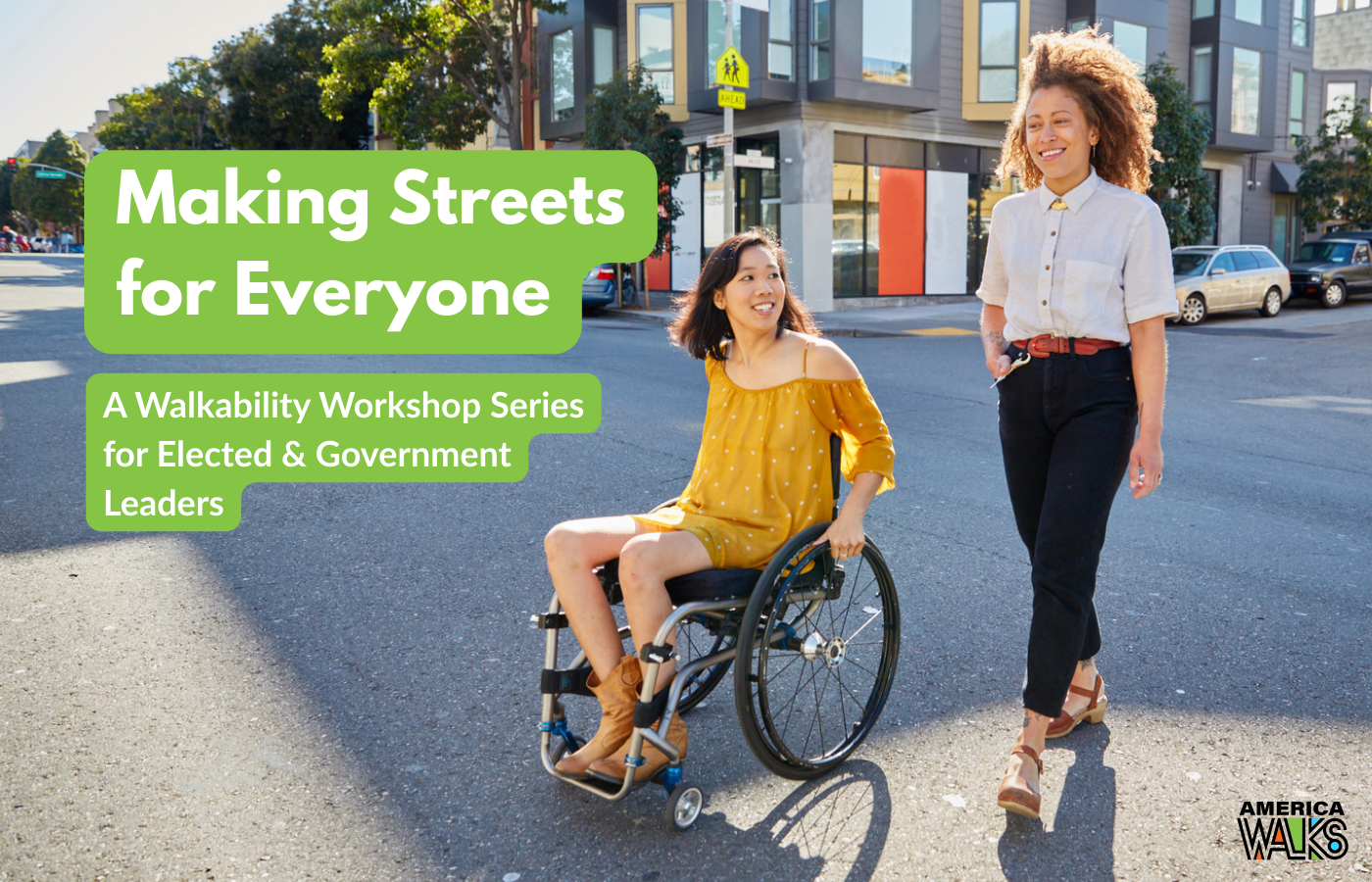 two people cross a street