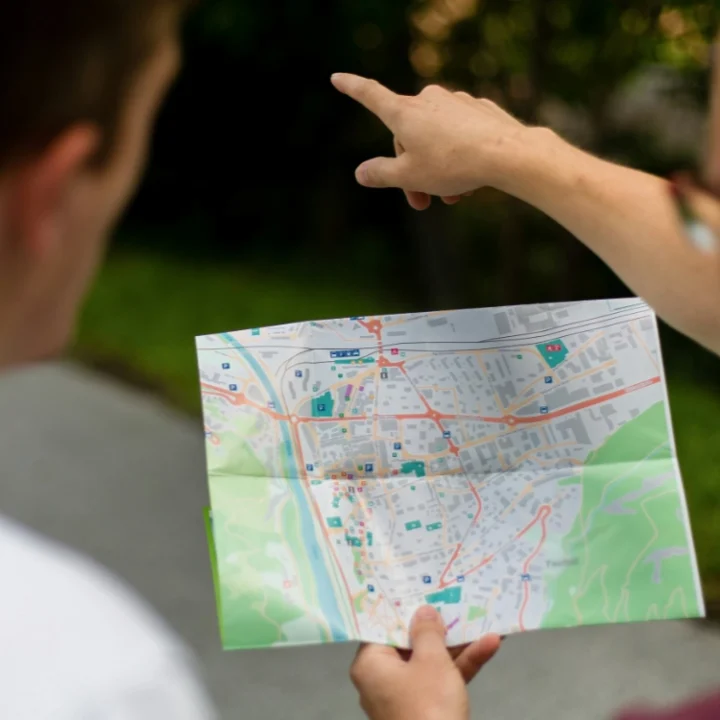 people consulting a map