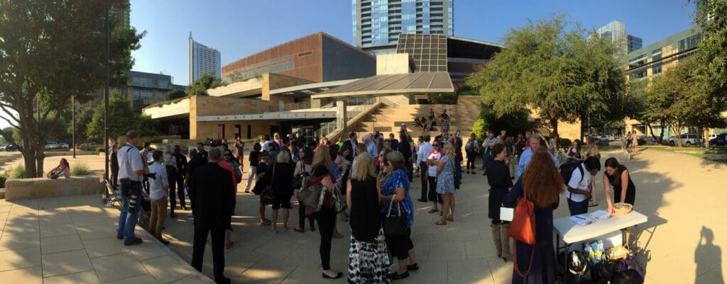 people standing outside a building