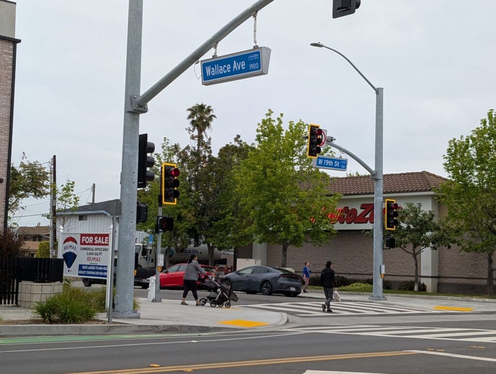 an intersection with walkable infrastructure including crosswalks and curb cuts