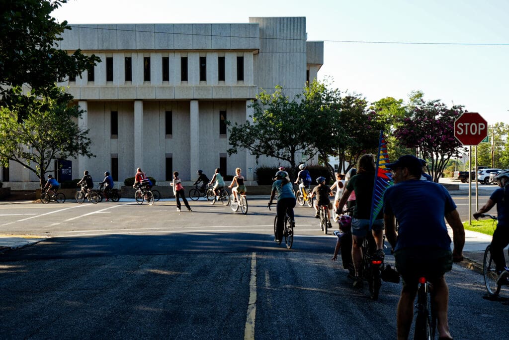 a photo of people biking to SCDOT's meeting